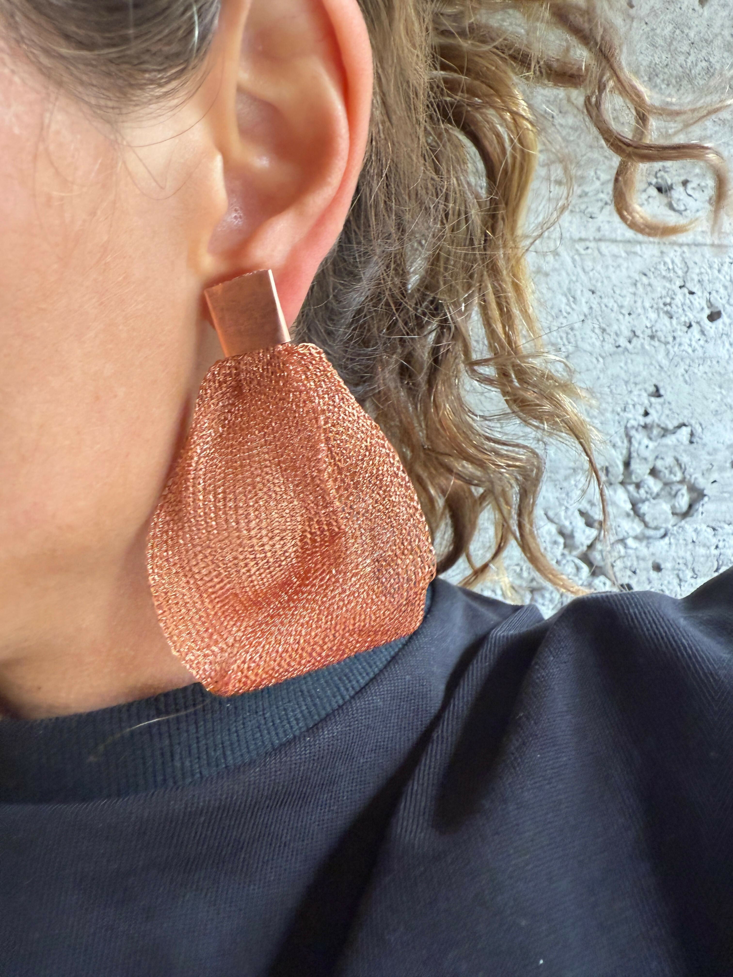 aro torcido cobre tejido