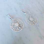 Aros Diente de león bañadas oro blanco