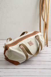 Bolso Impermeable · Crema con forro Cóndor Naranjo