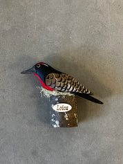 Loica tallada y pintada a mano