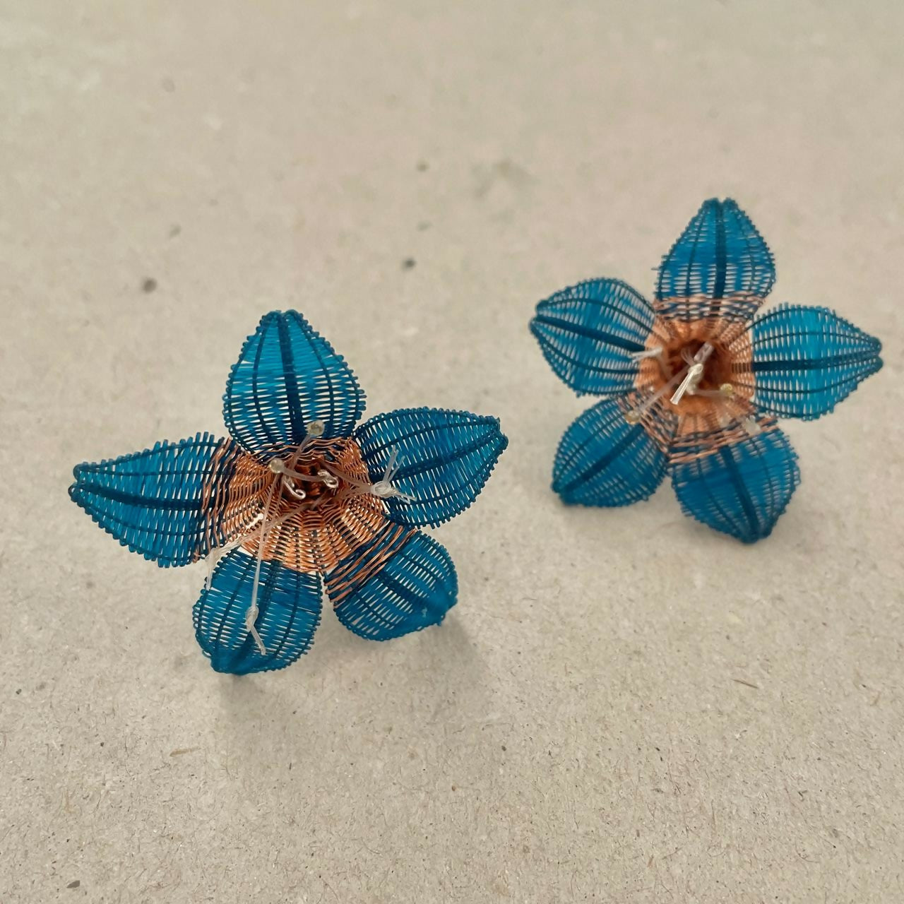 aro flor tope crin/Cu calipso (tienda)