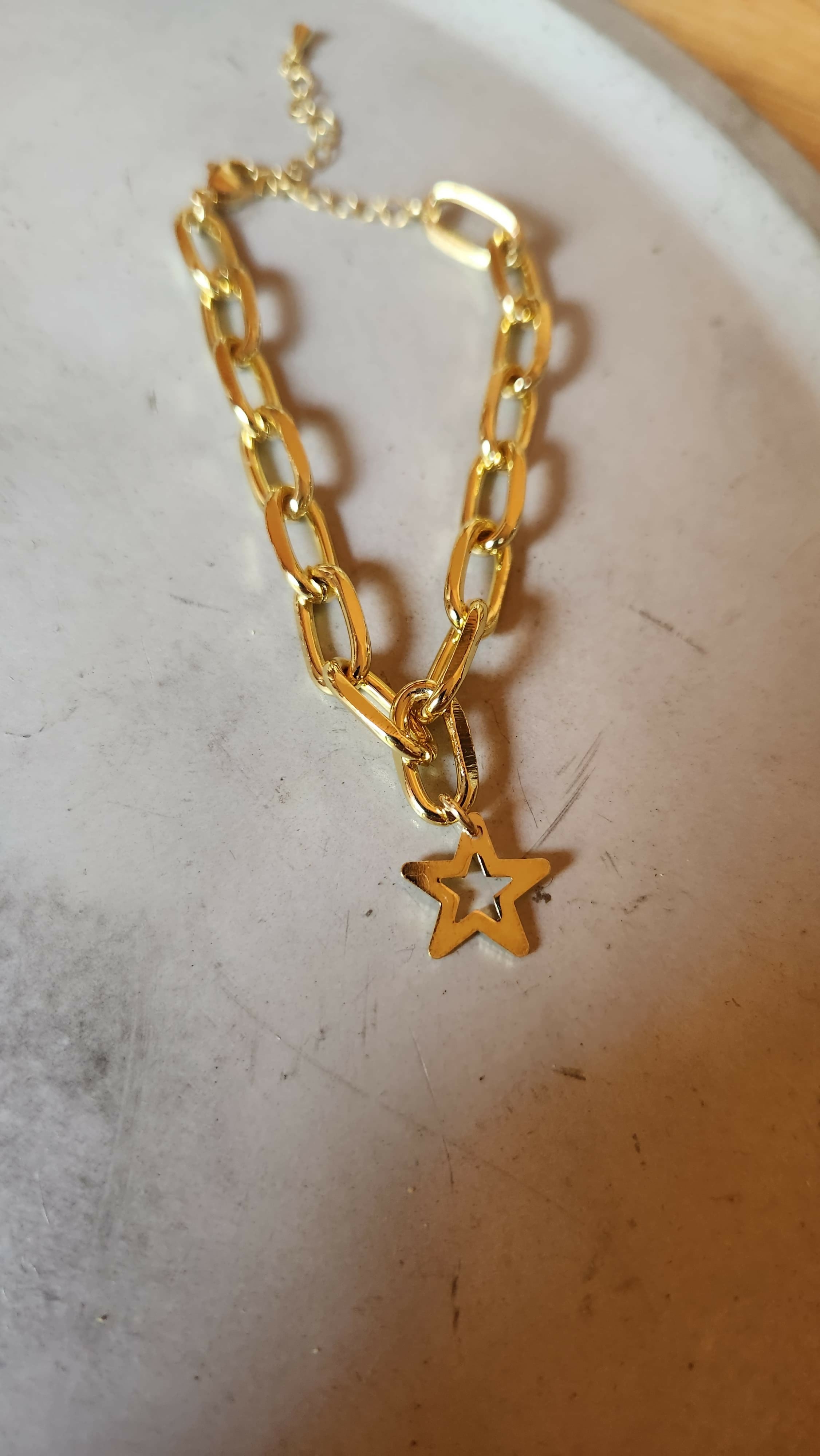 Pulsera eslabones con estrella solo borde baño oro