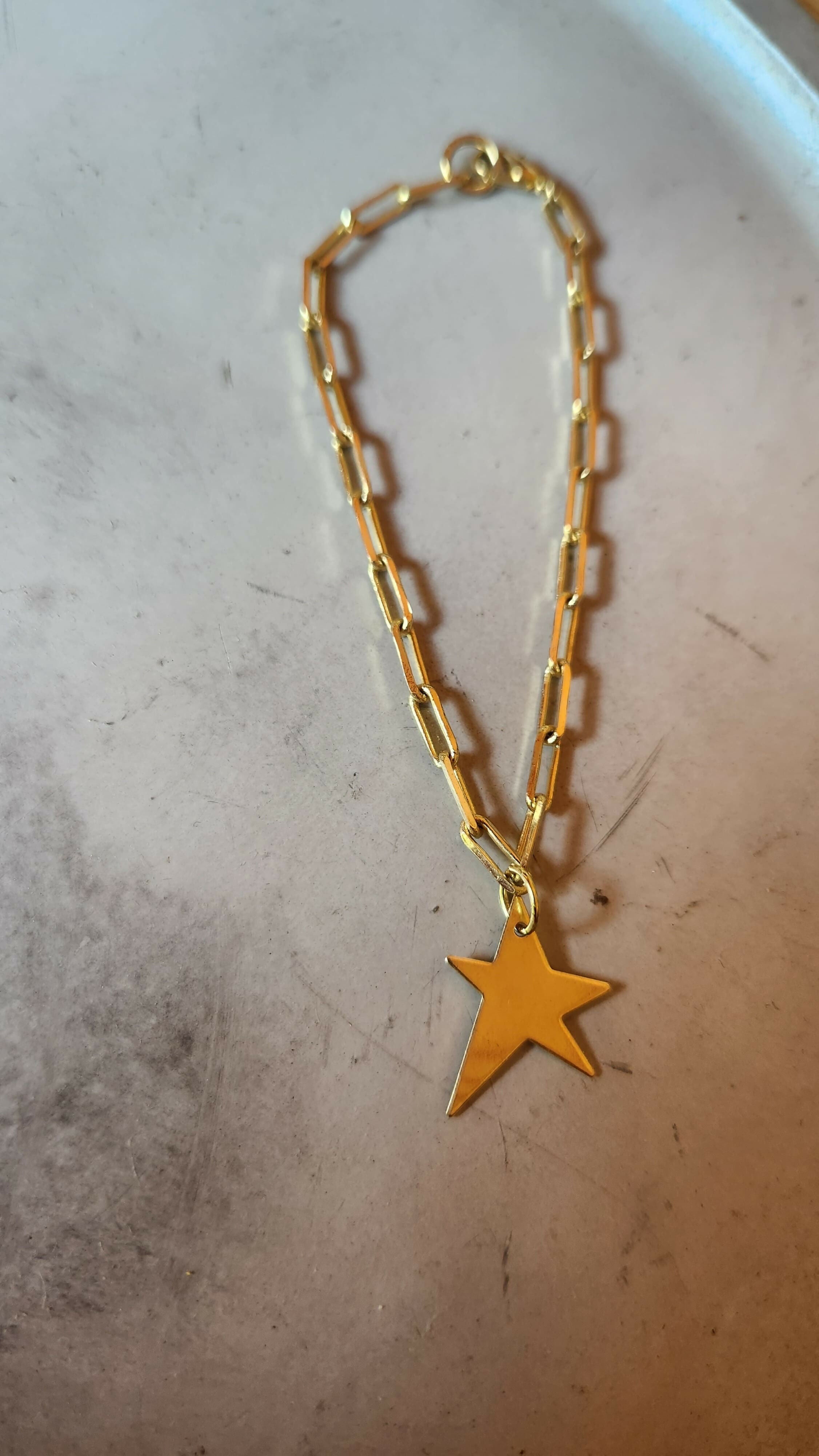 Pulsera eslabones con estrella irregular baño oro