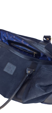 Bolso ULMMO Carpincho negro - forro cóndor azul
