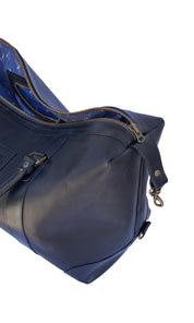 Bolso ULMMO Cuero Negro con forro cóndor azul