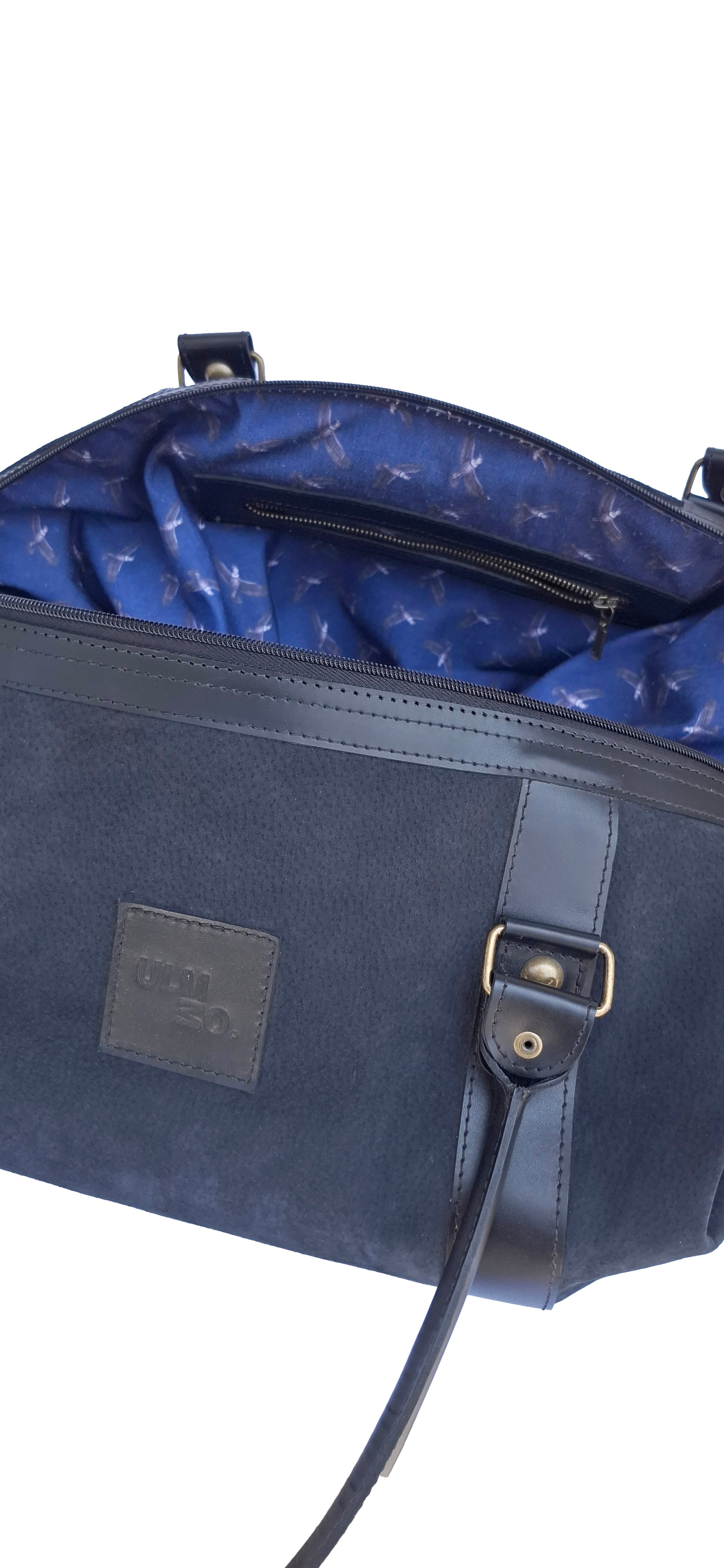 Bolso ULMMO Carpincho negro - forro cóndor azul