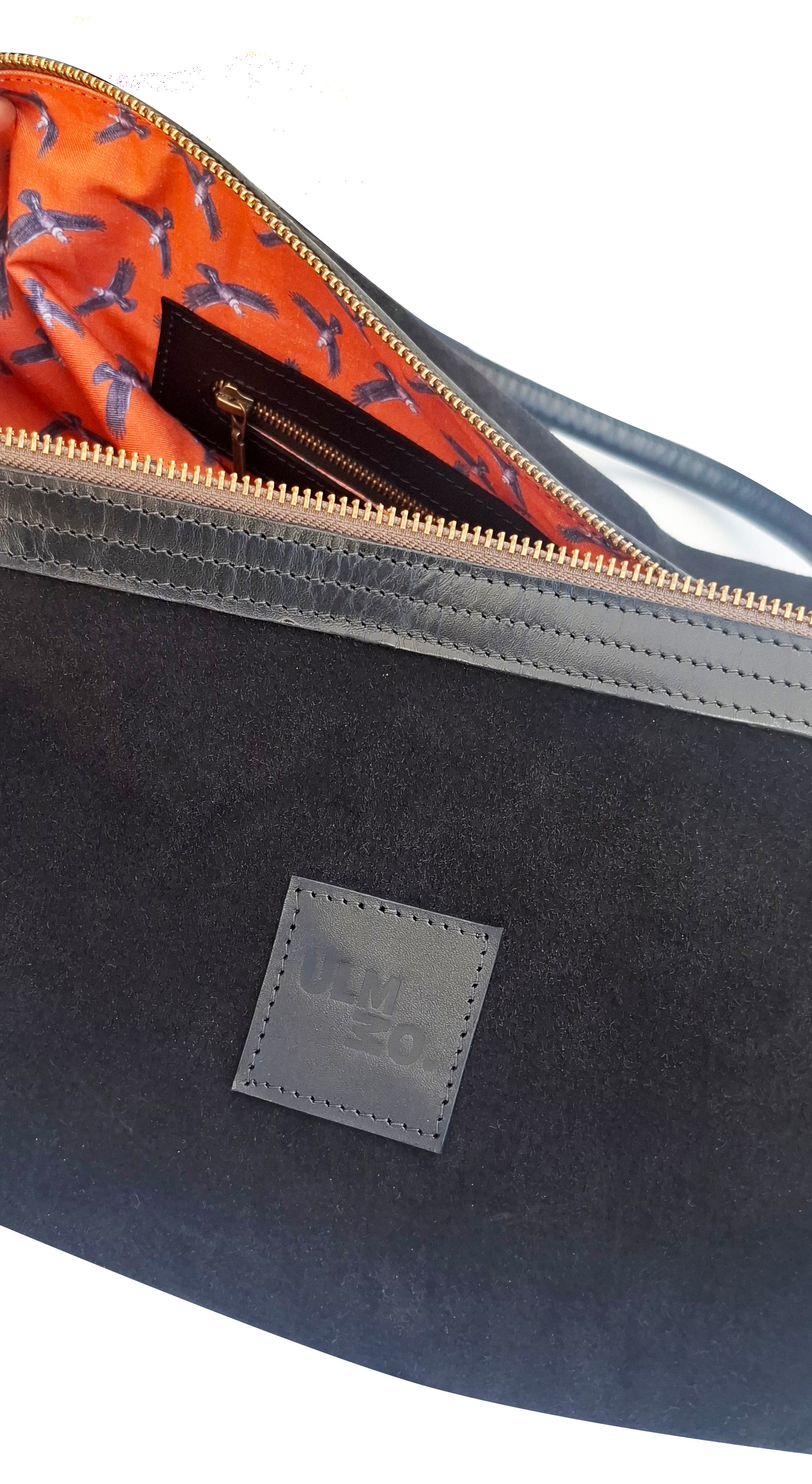 Bolso ULMMO Carpincho negro - forro cóndor Naranjo