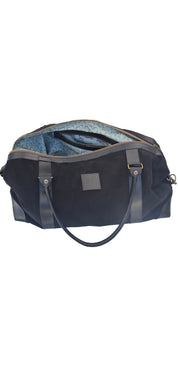 Bolso ULMMO Carpincho negro - forro cóndor Verde