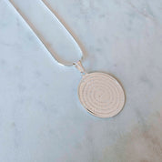 Collar Padre Nuestro bañado en oro blanco