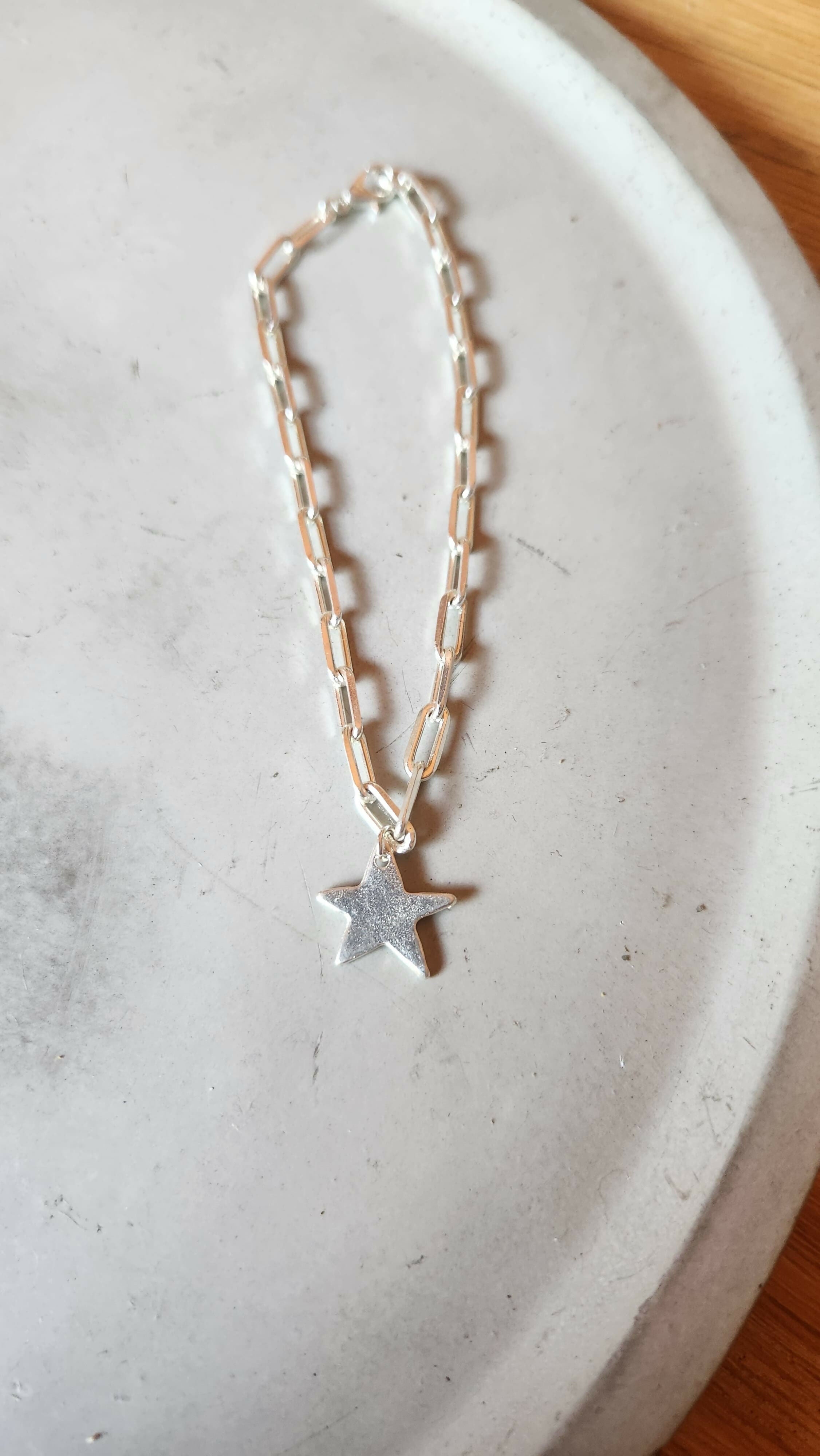 Pulsera eslabones con estrella baño plata