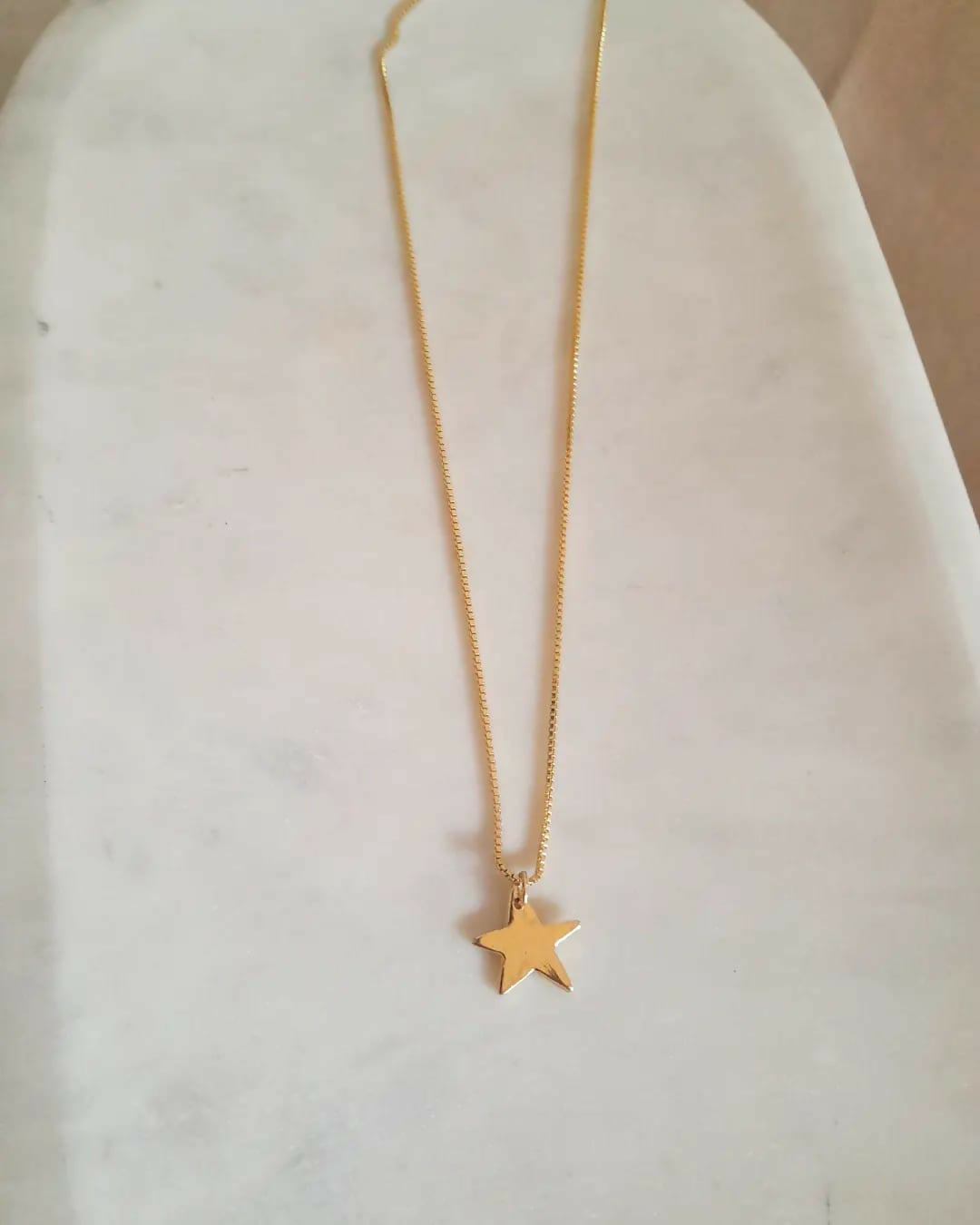 Cadena con estrella baño oro