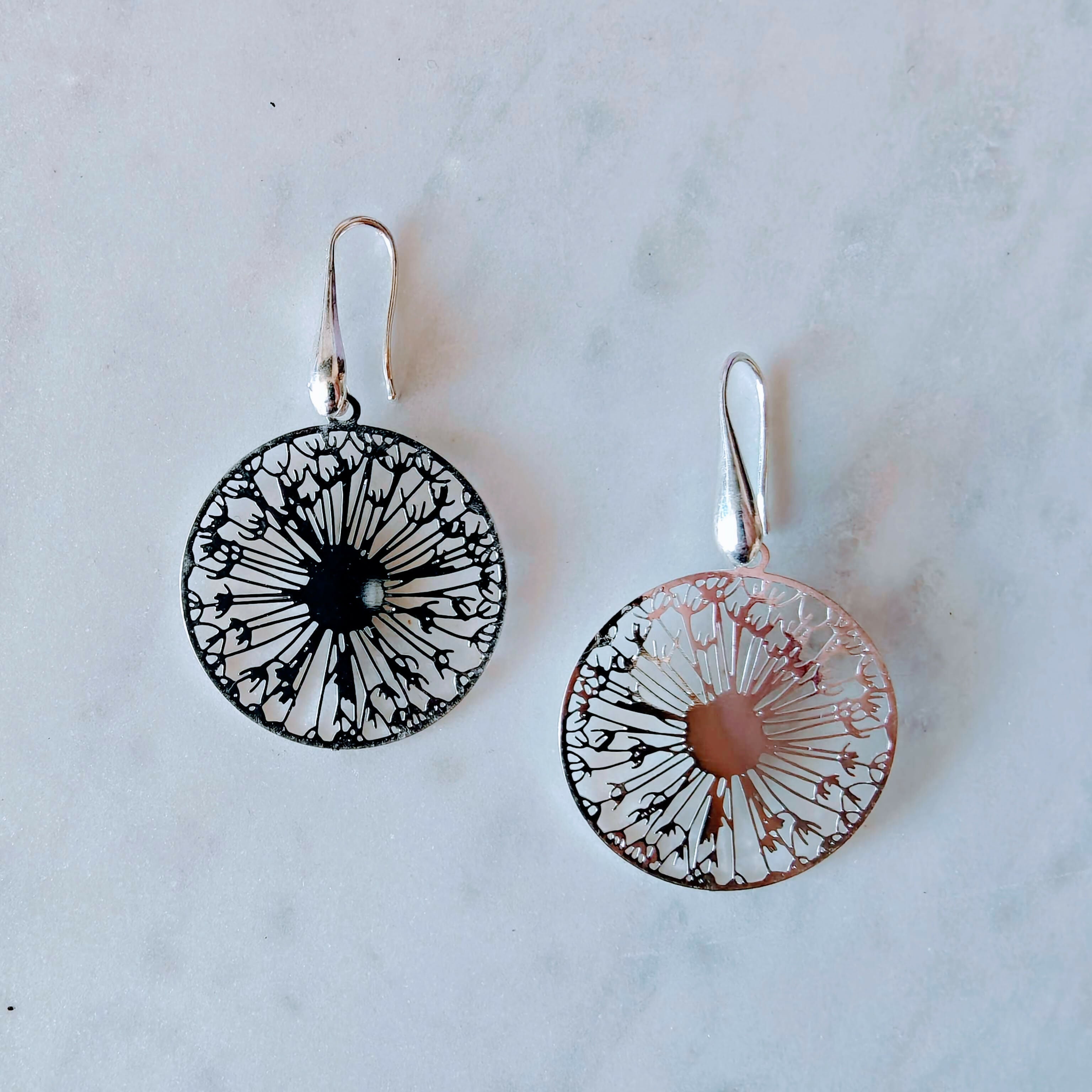 Aros Diente de león bañadas oro blanco