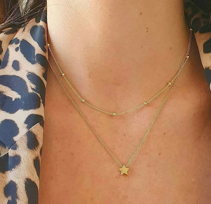 Cadena con pelotitas baño oro