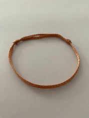 tobillera cobre tejida