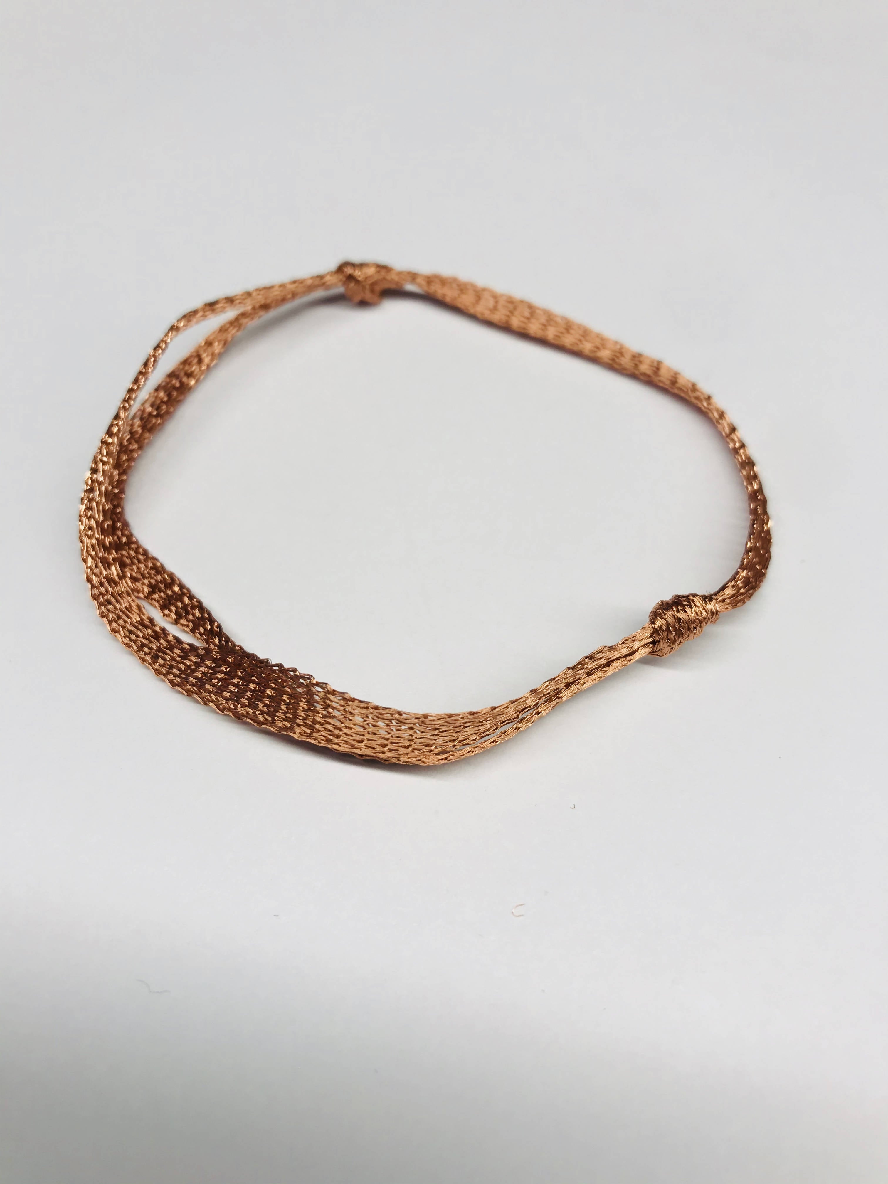 pulsera cobre tejida nudo corrido