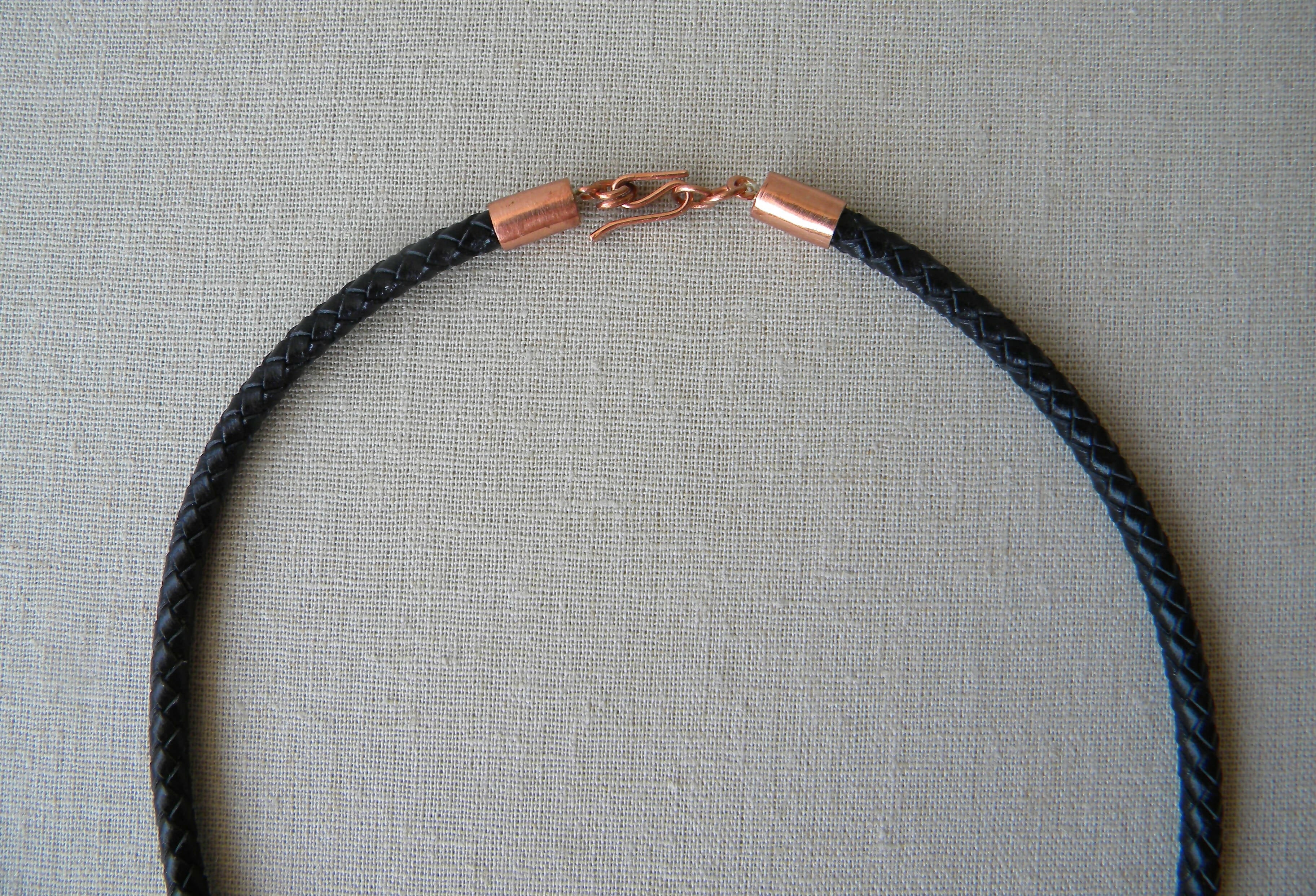 COLLAR COBRE CUERO TRENZADO NEGRO