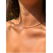 Collar cobre tejido nudo corrido