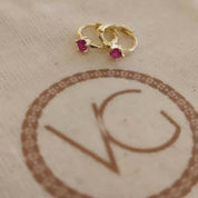 Mini argollas con circón rosado