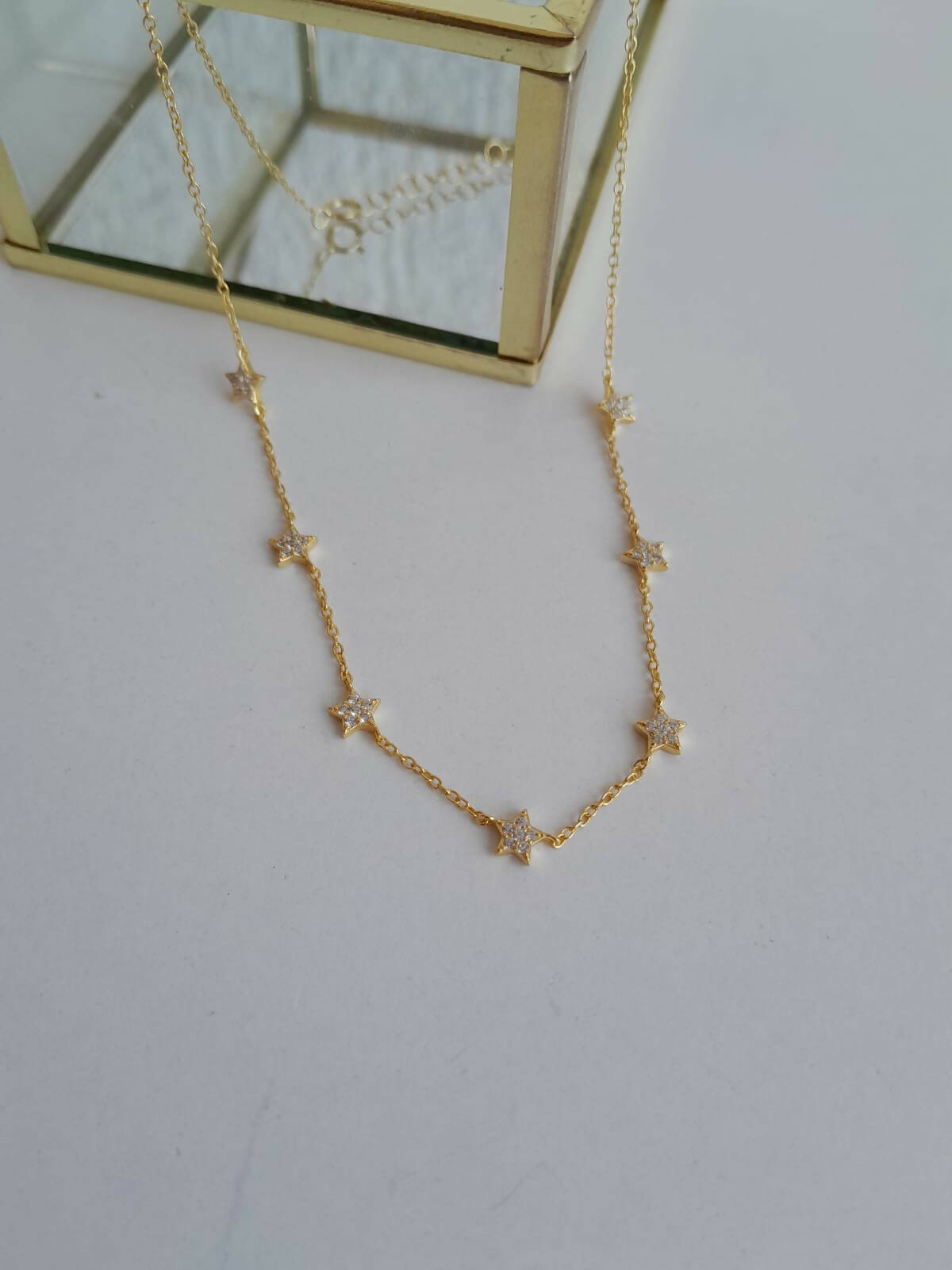 Chocker estrellas con circones baño oro