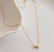 Cadena con 2 estrellas baño oro