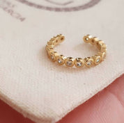 Cuff con circones baño oro (unidad)