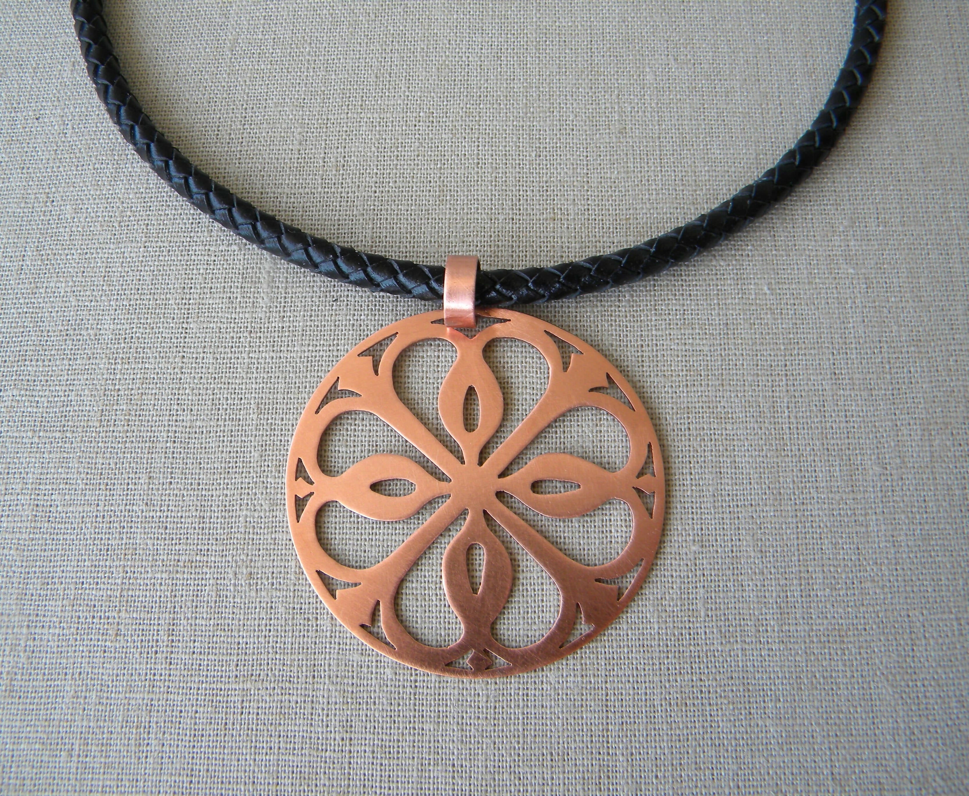 COLLAR COBRE CUERO TRENZADO NEGRO