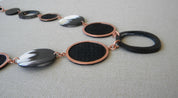 COLLAR COBRE CÍRCULOS SALMÓN Y CUERNO