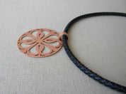 COLLAR COBRE CUERO TRENZADO NEGRO